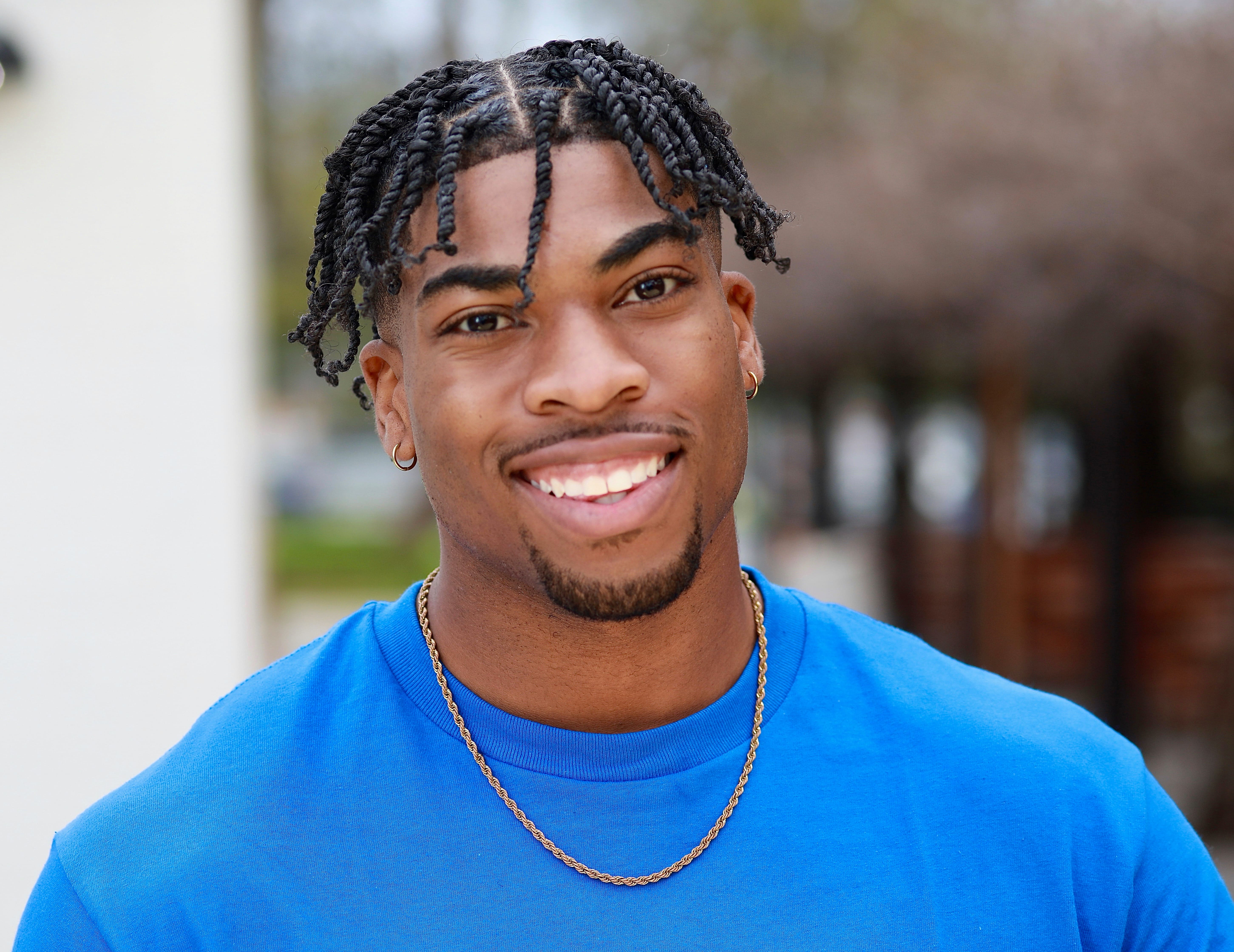 headshots - DanielEduHeadshotTwistpSmile-min.JPG